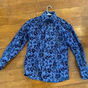 Angelo Galasso blue shirt.